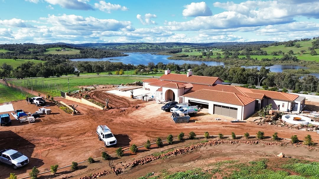 Aerial drone view of a completed custom COLORBOND® steel roof on a Perth home