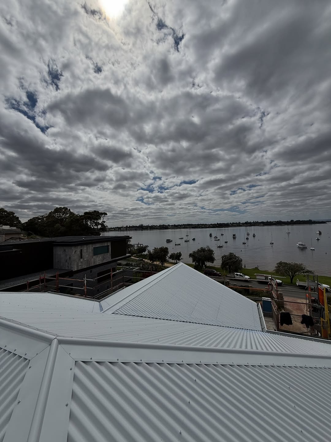 Completed COLORBOND® steel roof on a home in Peppermint Grove with a coastal view